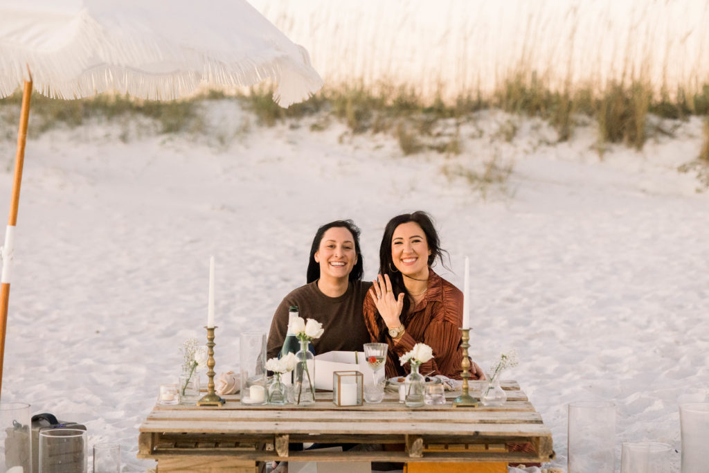 recently engaged couple on pensacola beach