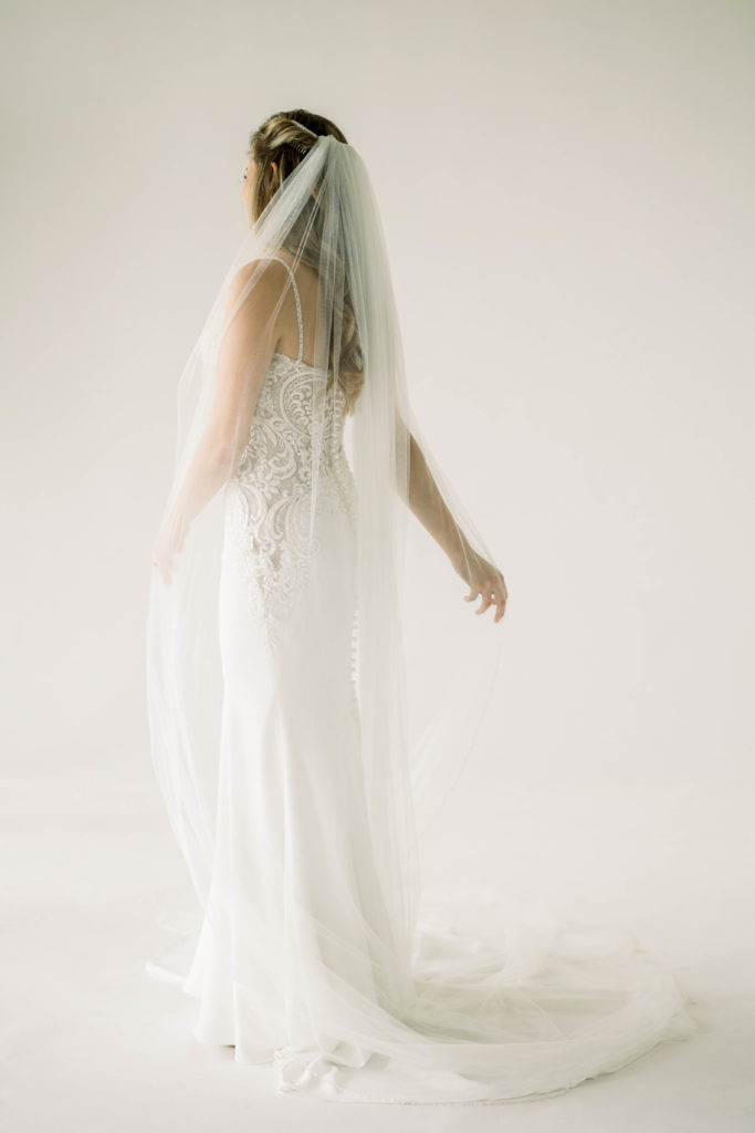 Back of wedding dress in studio for bridal portraits