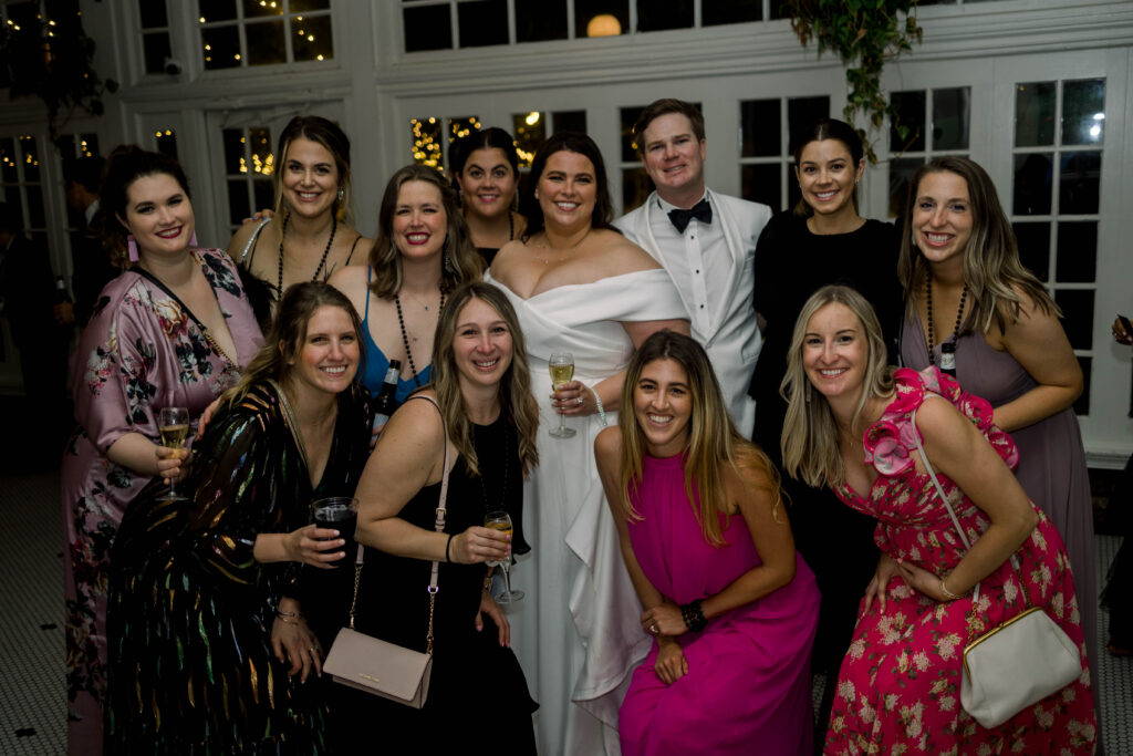 Bride surrounded by friends at Court of Two Sisters