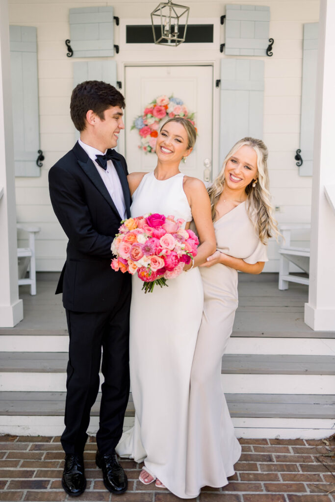 Bride with her brother and sister in Gulf Breeze at their Wedding
