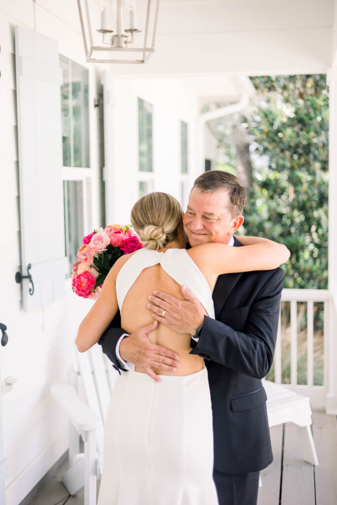 Bride hugging her Dad at Gulf Breeze Wedding