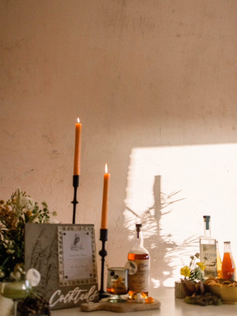 Candles with shadows at a wedding bar scene