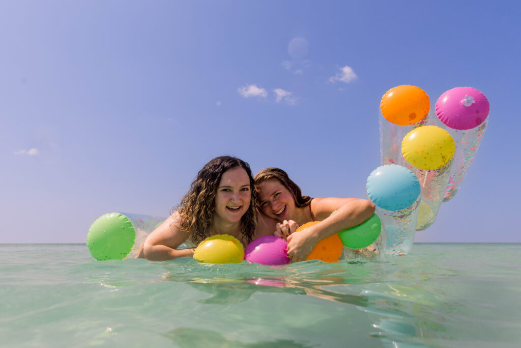 Besties on a floatie on Pensacola Beach