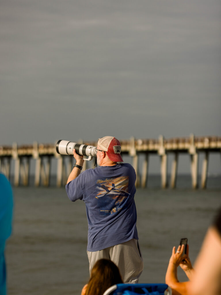 Photographer taking photos at Breakfast with the Blues in 2026